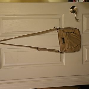Rosetti tan crossbody bag good used condition